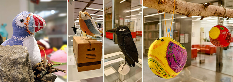 Textila fåglar av slöjdlärarstudenter vid IBIS, Konstfack, som ställer ut i skyltfönstret i Konstfacks bibliotek